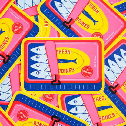 A playful assortment of The Perfect Sardine Can Vinyl Stickers stacked on one another.