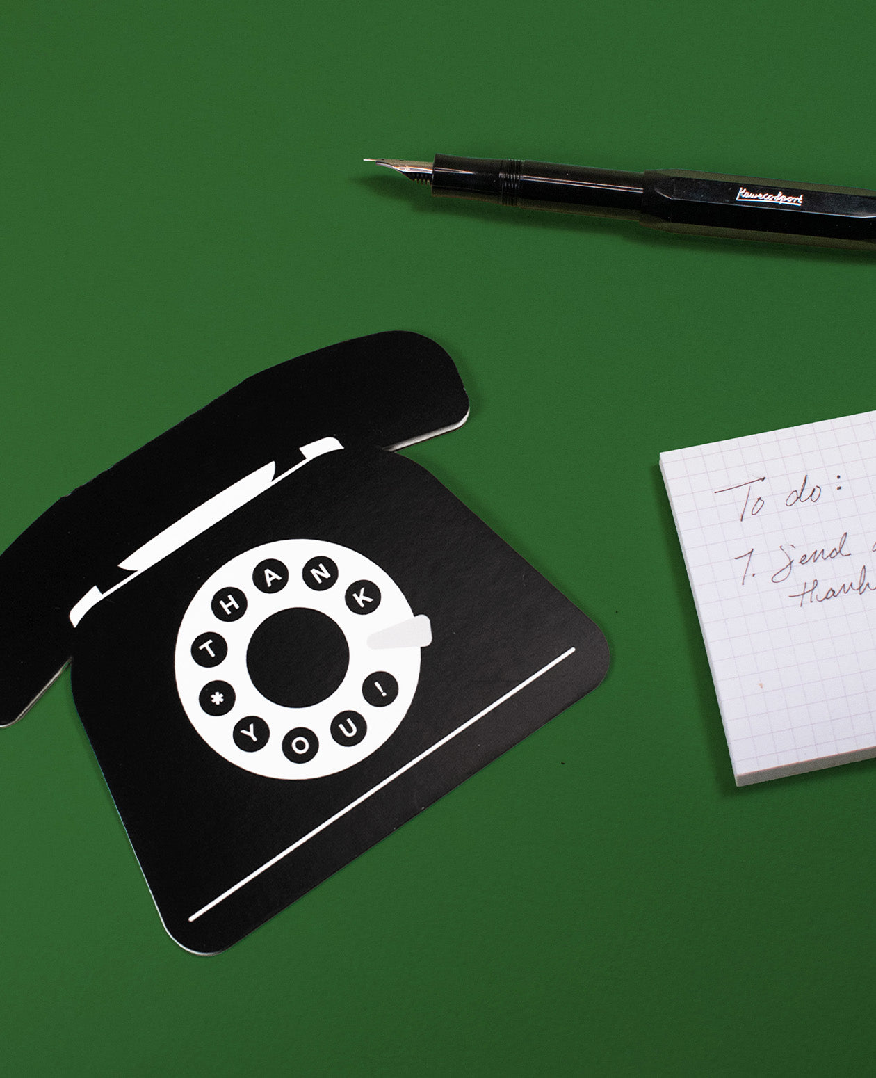 Unique Thank You Card featuring a rotary phone design with the words 'Thank You' printed on it, on a green background.